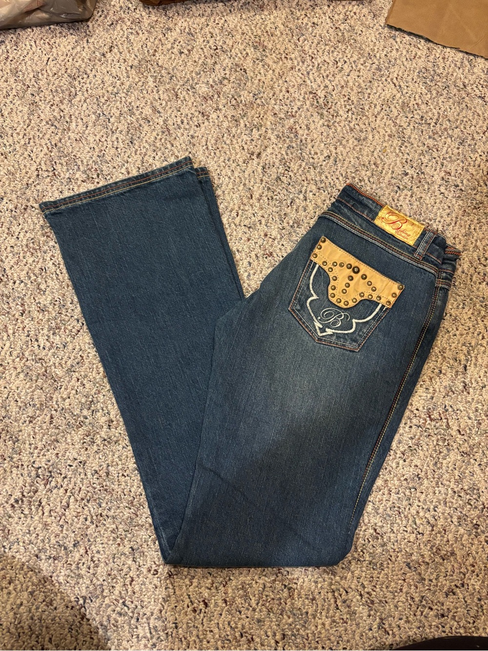 bebe Dark Blue Bootcut Jeans with Tan Studded Pocket
